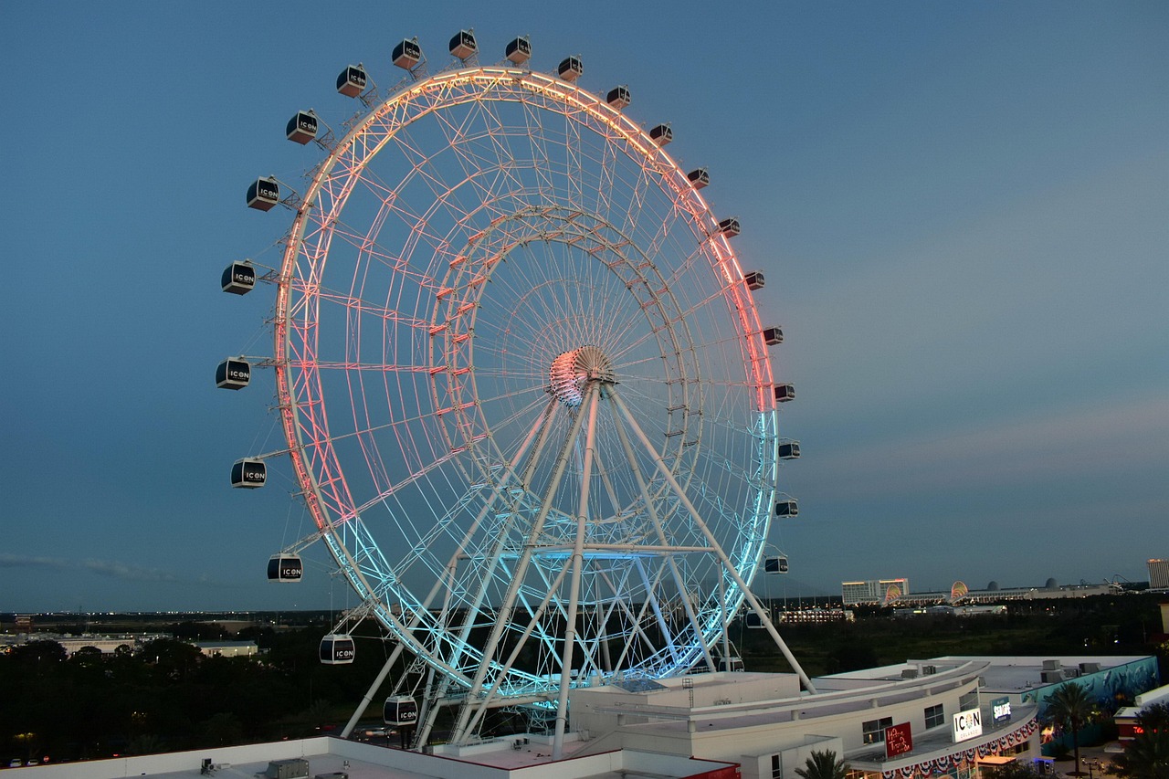 amusement, architecture, attraction, big wheel, business people, circle, disney world, ferris, fireworks, fun, holiday, hotels, joy, orlando downtown, nature, outdoor, resorts, round, sky, springtime, summer, theme parks, tourism, travel, vacation, wheel, blue circle, blue hotel